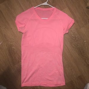 Pink Lululemon workout top